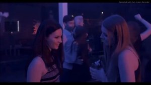 Female vampire bites girl at club