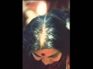 Shri Mataji giving individual Sahasrara Mantras