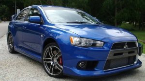 Восстановление разбитого Mitsubishi Evo за 14 минут!