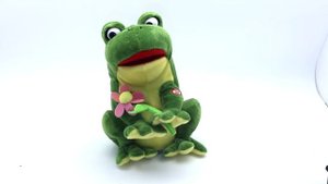 Поющая игрушка "Лягушка Монро с цветком " в http://podarkivsem.biz