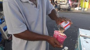 THE BEAUTY OF ST VINCENT AND THE GRENADINES: THE SNOW CONE MAN IN KINGSTOWN