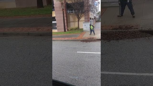 City of Columbia employee backing up storm drain?