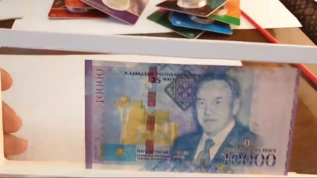 10000  Тенге Купюра С ПРЕЗИДЕНТОМ ПРОШЛОЕ И НАСТОЯЩЕЕ