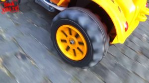 Dima on a tractor towing big car