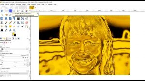 un visage en or avec GIMP