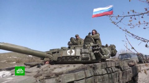 Жители Харьковской области встретили российских военных с флагами РФ