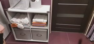 в ванной система хранения полотенец