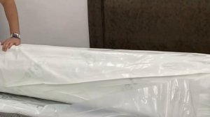 Распаковка скрученного матраса