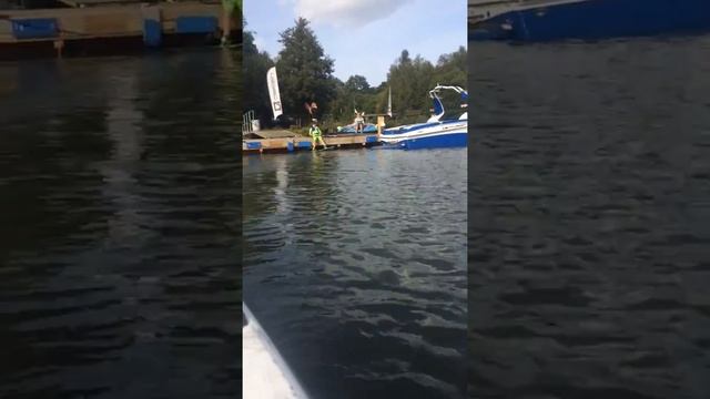 Elliott wakeboarding, sitting dock start.