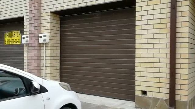 Секционные ворота DoorHan цвет 8017 (umdom123.ru)