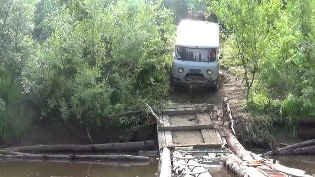 Восстановление моста через Деревянную и посёлок Катайга.