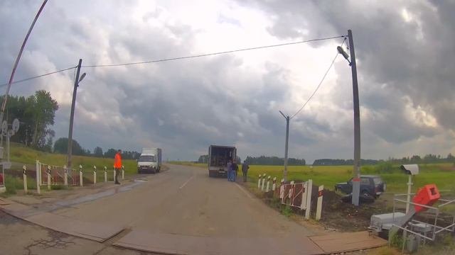 Железнодорожный переезд со шлагбаумом под Зырянкой