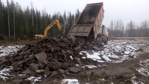 Строительство площадки из бутового камня для бурения скважин.