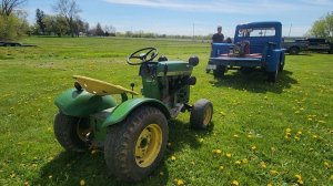 Putting tractors away and loading my JD 112 round fender!