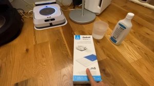 Irobot Braava Jet M6 mopping robot, how to place the dry and wet mopping pads, fill cleaner,  app