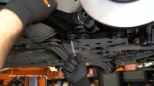 How to change front suspension arm on NISSAN MICRA K12 [TUTORIAL AUTODOC]