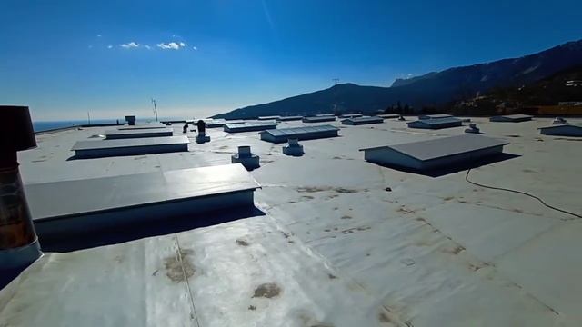 Автотранспортное предприятие в Ялте. Ремонт кровли при помощи ПВХ мембраны Пластфоил. смотреть онлайн