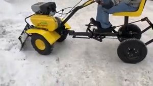 Мотоблок зимой в комплектации со снежным отвалом и пахотным модулем / Tillers in winter