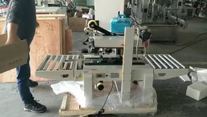 AU-R-6050 Упаковщик картонных коробок