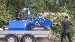 Дробление деревьев в щепу.