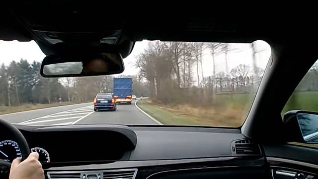Mercedes S-Class driven on a two-laned highway