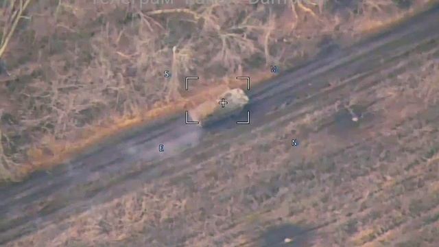 Эпичные кадры прилета"Ланцета"по украинской БРДМ-2 с противодронной сеткой. Южнодонецкое направление