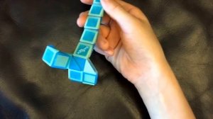 Rubik's Twist Or Smiggle Snake Puzzle Tutorial: How to make a Penguin Shape SLOW Step by Step