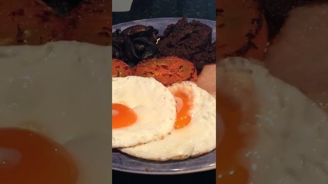 Black pudding with bacon and eggs