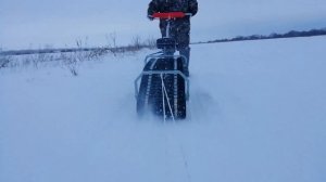 Снегоход мотобуксировщик лыжника