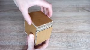 Как сделать копилку из картона?Легко?