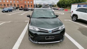 Купил правый руль с аукциона Японии в Москве Toyota Corolla Fielder Hybrid WxB