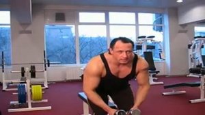 Разведение рук с гантелями стоя в наклоне