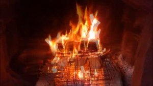Огонь горящий в камине. Расслабляющая музыка/A fire burning in the fireplace. Relaxing music.