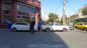IRAN - Walking tour in a street full of life in the west of Tehran city - Iran walk 2022