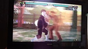 Tekken 6 Wang JinRei(Xing Yi Quan) vs Eddy Gordo (Capoeira)