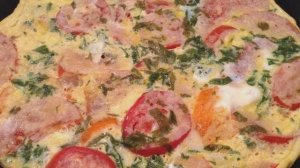 Жареные кабачки с помидорами и яйцом