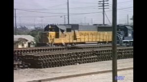 Colton Crossing 1986 incl. UP train w/ Farmer John "hog block" Class S-40-16 stock cars