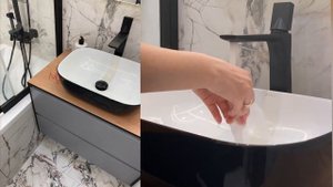 Чёрная раковина в современном интерьере ванной