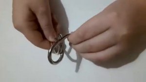 решение головоломки металл кольца.