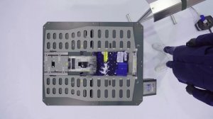 Thermotron FX25S Automatic folding, stacking and bagging machine for garments.