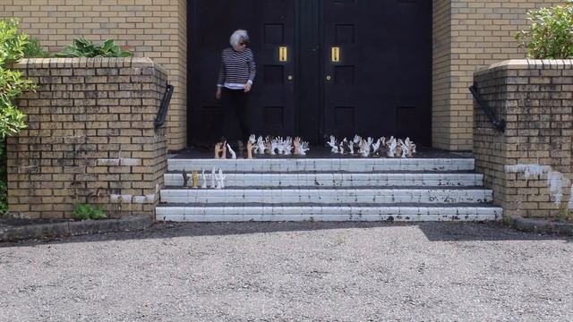 100 ceramic hands by Helen Birnbaum