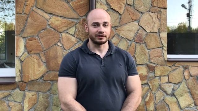 Отделка фасада камнем и декоративной штукатуркой