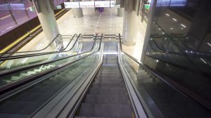 Poland, Warsaw, Nowy Świat-Uniwersytet metro station, 1X OTIS elevator, 2X escalator - going down