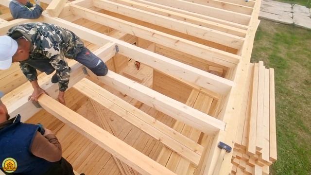 Строительство двухэтажного дома из бруса 10 на 10 с угловой террасой. Процесс и качество работы