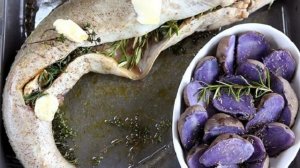 Осетр, запеченный в духовке целиком