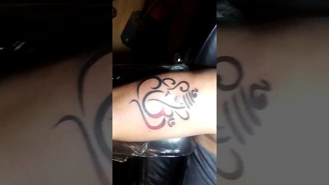 Ganesha Tattoo with om made yesterday: Ganesh ji Tattoo design