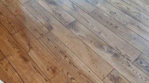 Укладка массивной доски из дуба.