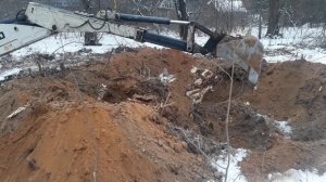 Корчевание пней трактором.