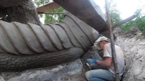 скульптура  дракона  из  бетона.  хвост  дракона  как  сделать  чешую  дракону.