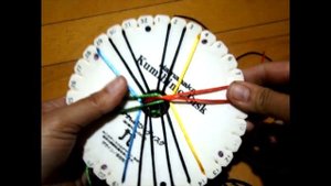 Плетеный браслет Кумихимо.